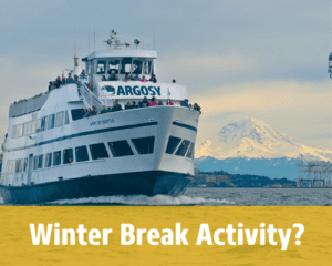 Argosy Cruises large vessel in the Puget Sound with Mount Rainier in the background. Photo text says "Winter Break Activity?"